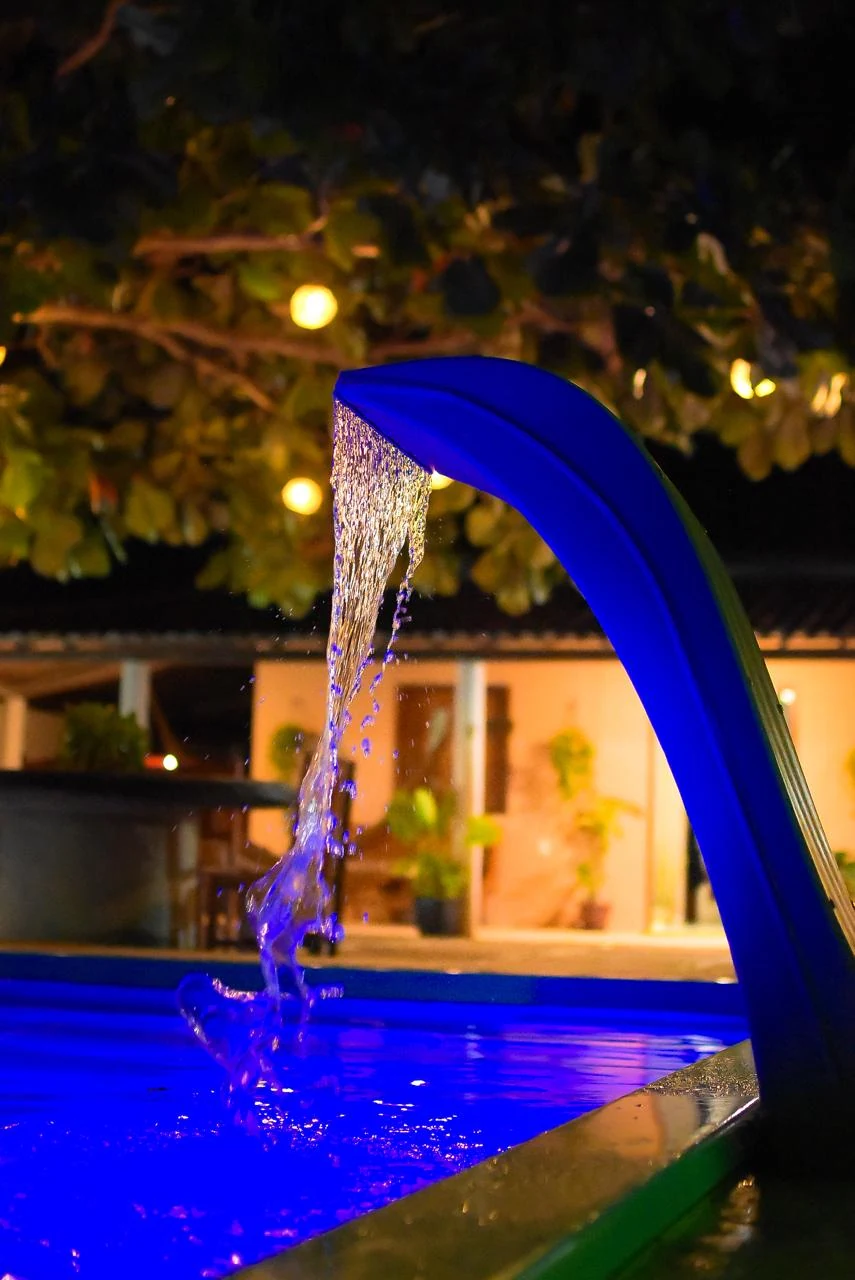Cascata da piscina à noite, casa em Jericoacoara